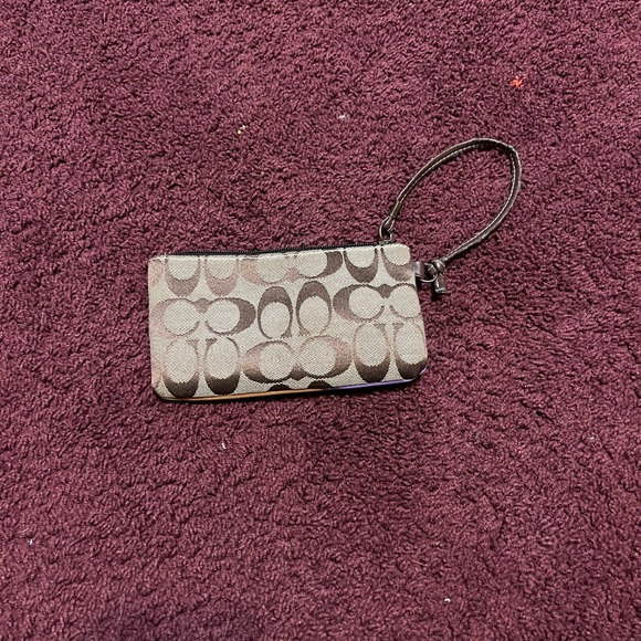 Coach Handbags - Coach Wristlet with color blocked back side !